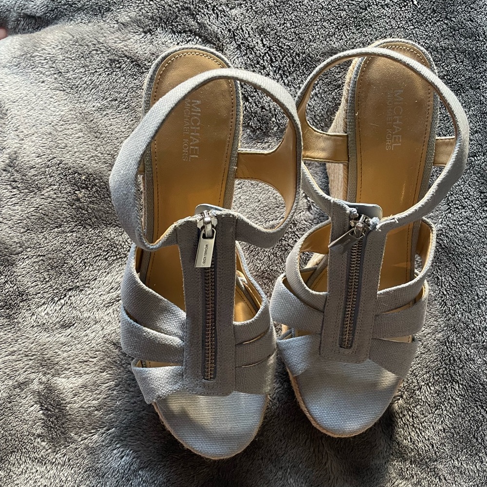 Baby blue Michael Kors wedges. Gently used. Size 9.